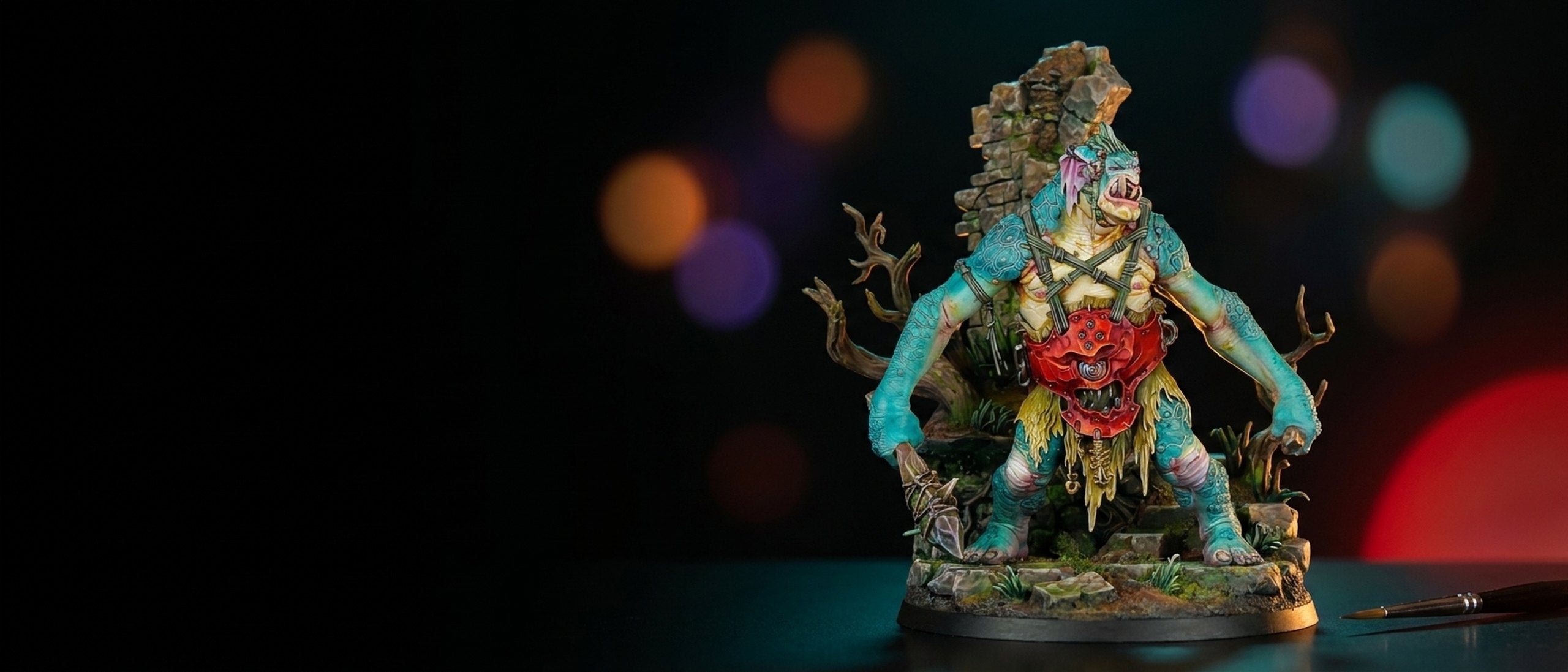 Teal display ogre miniature